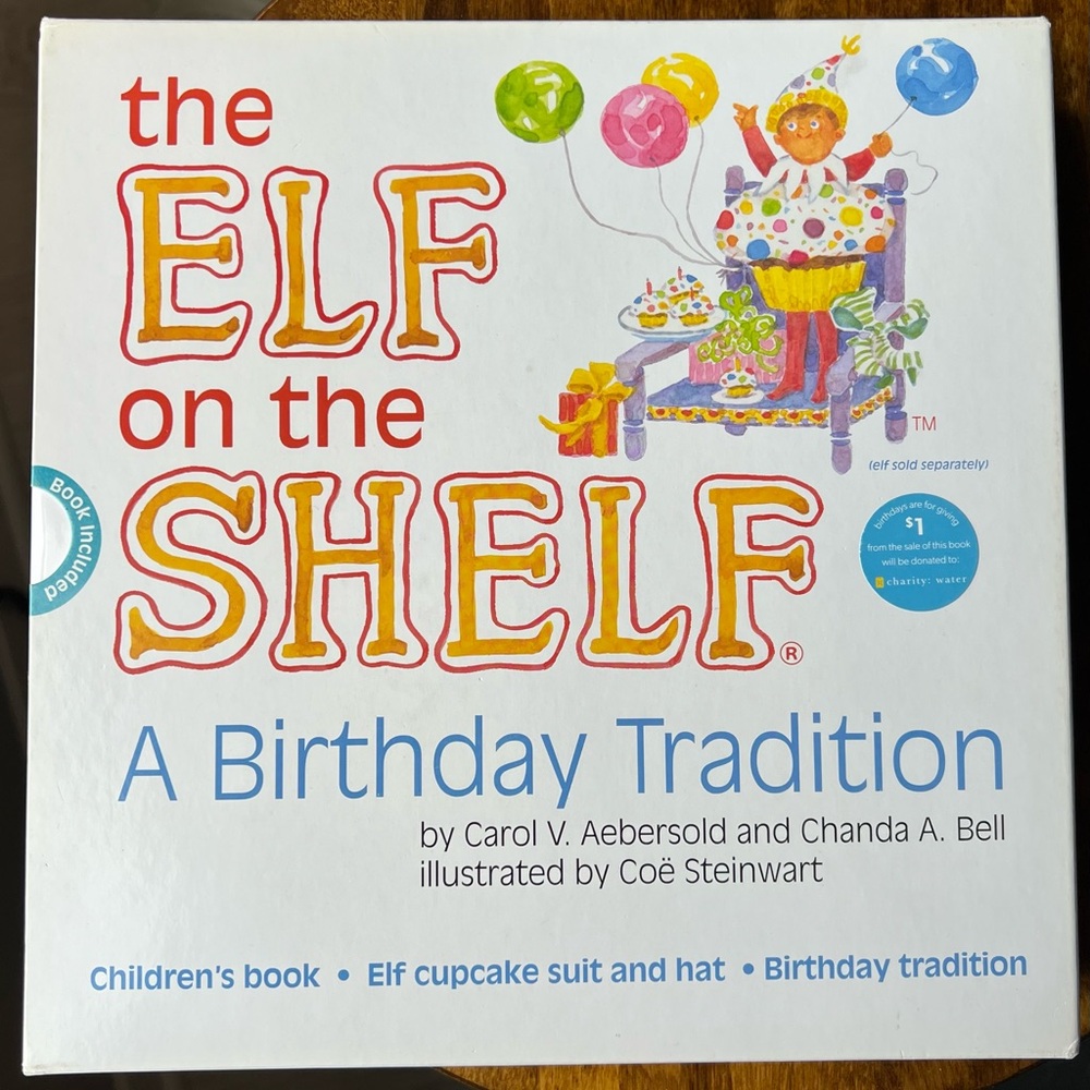 Elf on the Shelf book and birthday cupcake suit set. Brand new, never been used.